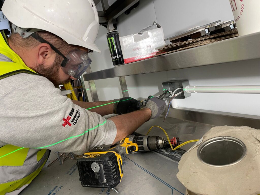 electrician repairing water heater